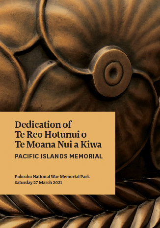 Cover of dedication booklet featuring close up of carving