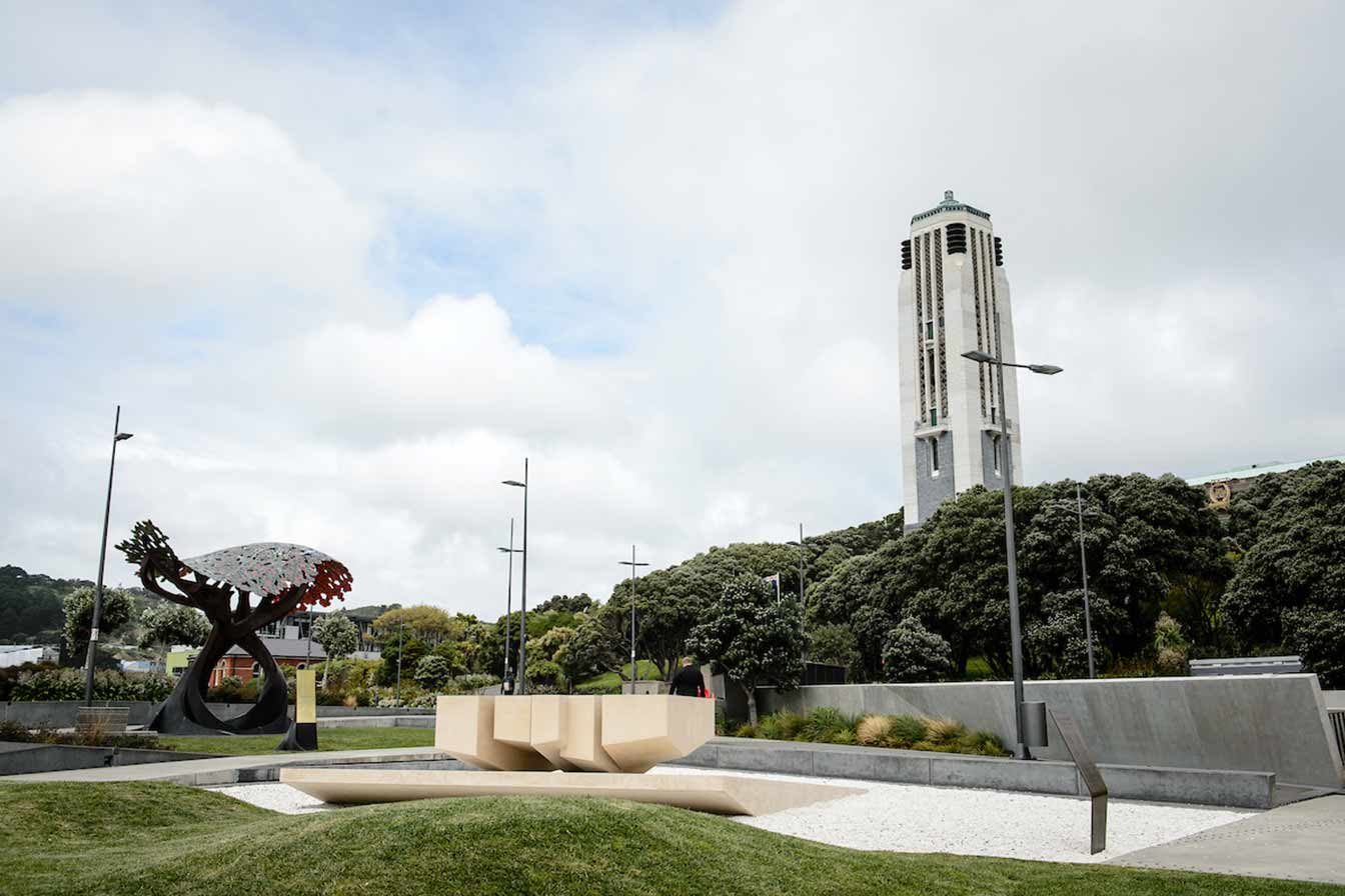 Wide angle photo of Pukeahu park with the UK, French and Carillion visable.