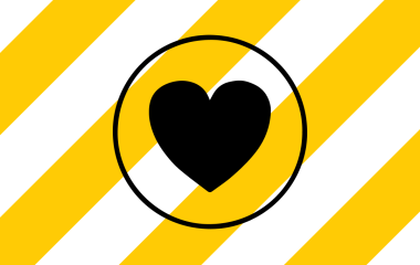 A black heart with yellow stripes in the background