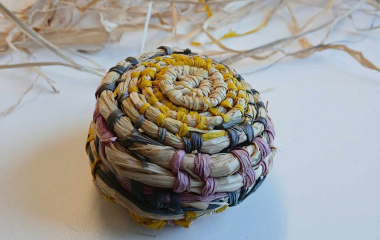 a small woven rattan balll.