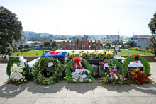 5 floral wreaths alongside the Tomb of the Unknown Warrior